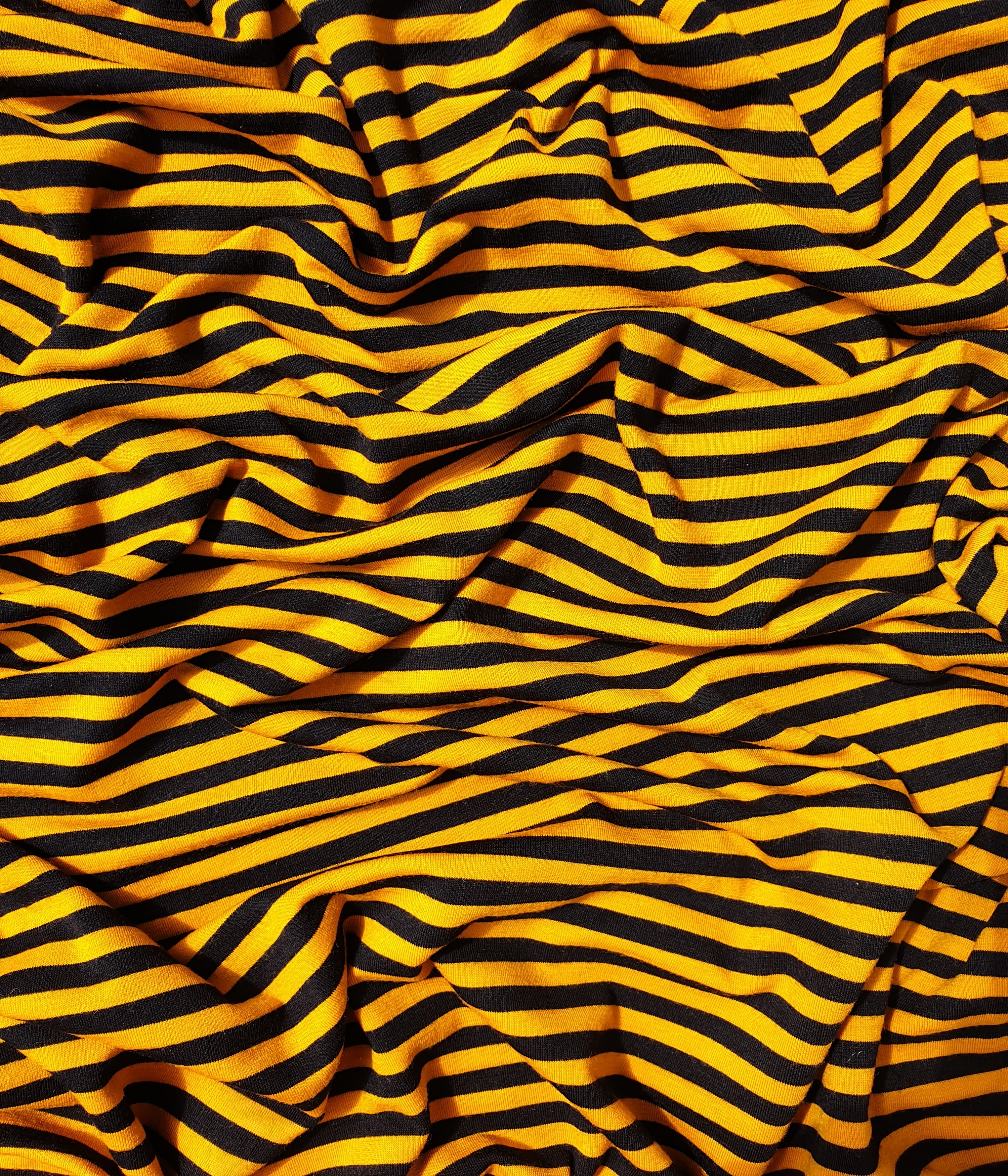 Dickerer Merino Singlejersey Mango / Schwarz gestreift  